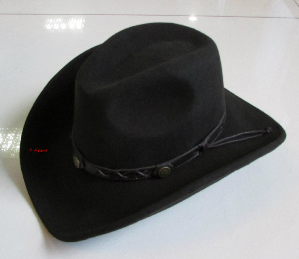 Stylish black wool bowler hat with a leather strap, perfect for cowboy and rock fashion outfits.