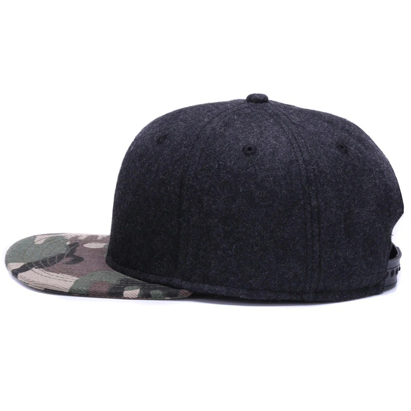 Stylish black snapback baseball cap with camouflage flat brim, perfect for adding a modern touch to casual outfits.