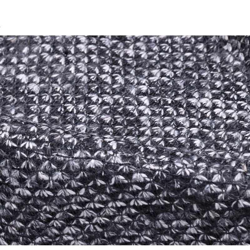 Close-up of textured wool fabric in grey tones, perfect for stylish fedora hats.