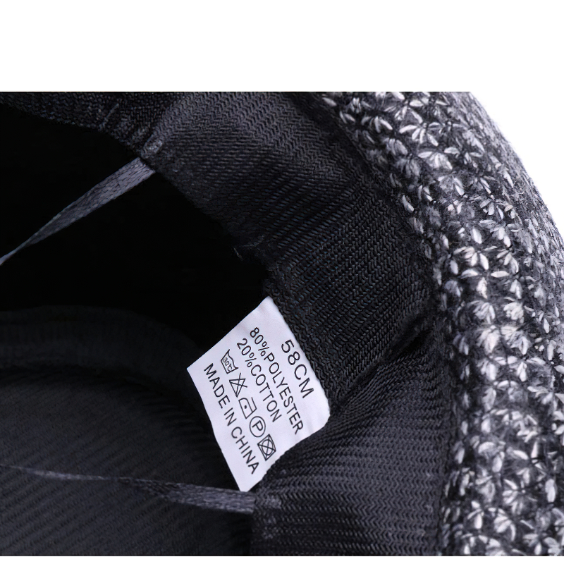 Inside view of woolen felt fedora hat showcasing size label and fabric details, elegant black ribbon accent.