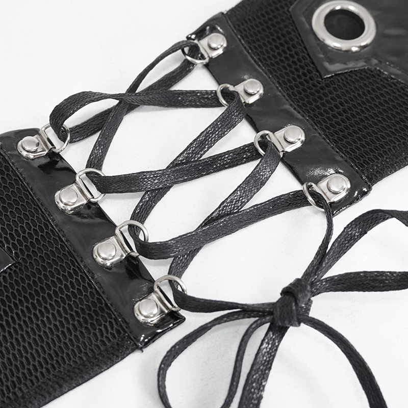 Close-up of a black corset belt featuring silver rivets and laces, perfect for gothic and steampunk styles.