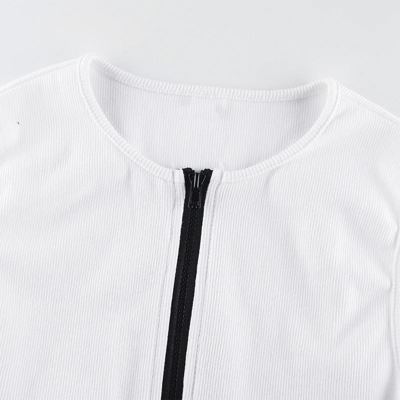 Close-up of a white bodysuit neckline with black zipper, showcasing a stylish and sleek summer design for women.