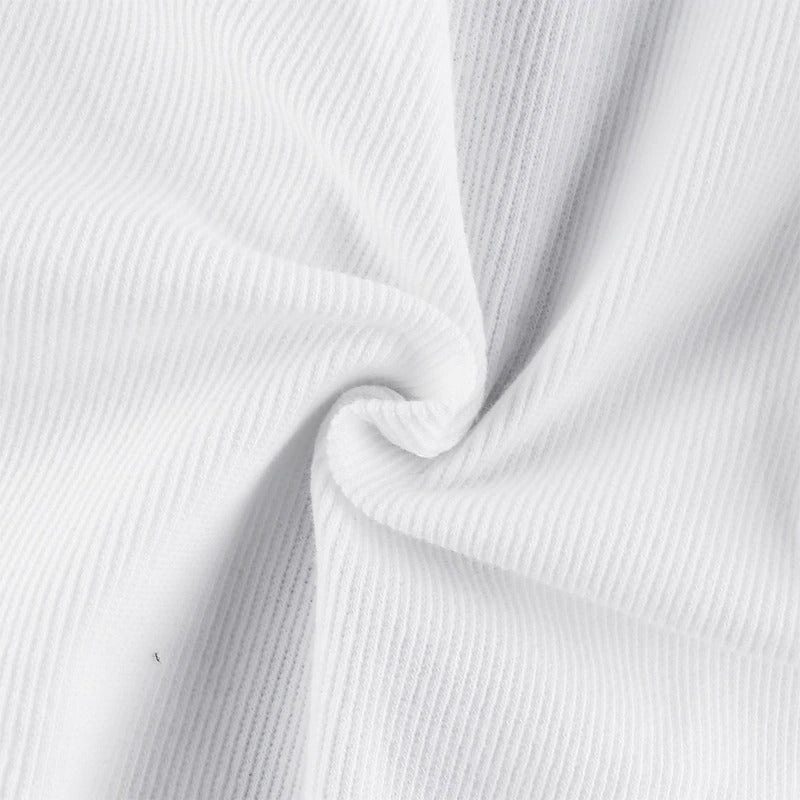 Close-up of soft white ribbed fabric showcasing texture for swimwear or bodysuits.